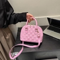 Pink faux leather handbag with checkerboard embossing and gold-tone hardware detail - Pink