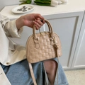 Chic beige crocodile shell handbag with textured pattern and gold hardware - Khaki