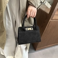 Retro black suede handbag with gold twist-lock closure and elegant dual top handles - Black