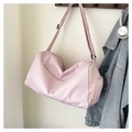 Detailed view of pink waterproof nylon gym bag with independent shoe compartment - Pink