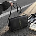 Minimalist black vintage shoulder bag with textured PU leather and gold buckle closure - Black
