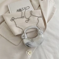 Silver crescent handbag with wave texture and beaded chain in metallic finish - Silver