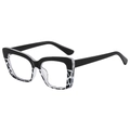 Occhiali moderni cat-eye con parte superiore nera e montatura maculata leopardata trasparente - Montatura Demi Nera