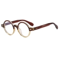 Ovale Retro-Brille in Braun und Gelb mit goldenem Flügeldekor am Bügelgelenk - Transparentes Champagner und Tee