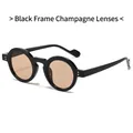 Retro round black sunglasses with champagne lenses and golden rivet detail accents - Black Frame Champagne Lens