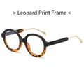 Occhiali rotondi anti-luce blu con montura leopardata nera e stanghette in metallo oro - Leopardo Nero