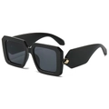 Retro square sunglasses in black with golden snake hinge detail at a 45-degree angle - Black Frame Grey Lens