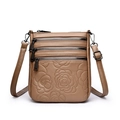 Brown leather crossbody bucket bag with embossed rose pattern and multi-zipper detail - Khaki