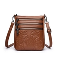 Brown leather crossbody bucket bag with multi-zipper layers and rose embossed floral pattern - Yellow Brown