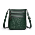 Dark green pebbled leather crossbody bag featuring embossed floral details and triple zippers - Green