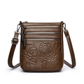Deep brown embossed rose crossbody bag with triple zipper and adjustable strap - Coffee