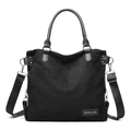 Large black faux suede tote bag with leather straps and silver buckle accents - Black