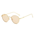 Retro oval sunglasses with gold metal frame and translucent tea lenses in 45-degree view - Regular / Regular (Incl. 13% VAT) Gold Frame Champagne Lenses
