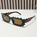 Gafas de sol verde oscuro en zigzag con lentes ámbar y patillas de leopardo - Marco Verde Lente Té