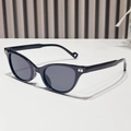 Occhiali da sole cat-eye neri alla moda con dettagli in metallo e lenti polarizzate scure - Montatura Nera Lenti Grigie