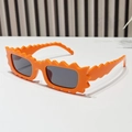 Irregular jagged orange sunglasses with dark grey lenses for fashion-forward women - Orange Frame Grey Lens