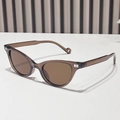 Occhiali da sole cat-eye marrone traslucido con decorazione in metallo argento B - Montatura Tè Lenti Tè