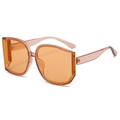 Oversized peach frame sunglasses with translucent orange lenses and metal accents - Champagne Frame / Tea Lens