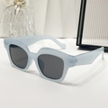 Fashionable light blue square sunglasses with dark lenses in a 45-degree angle display - Regular / Blue Frame Grey Lens