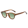 Retro round tortoiseshell sunglasses with dark green lenses and silver rivet accents - Leopard Frame Gradient Green Lens