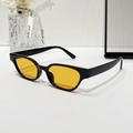 Retro cat-eye sunglasses with sleek black frames and vibrant orange tinted lenses - Black Frame Yellow Lens