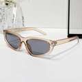 Occhiali da sole cat-eye chic con montatura ambra tartarugata e lenti grigio scuro - Montatura Champagne Lenti Grigie