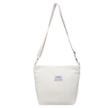 Minimalist beige canvas tote bag with pleated texture and wide geometric shoulder strap - White