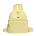 Wasserabweisender hellgelber Nylon-Rucksack mit plissiertem Reißverschlussfach vorne - Gelb