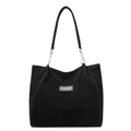 Large black suede tote bag with woven shoulder straps and silver metal chain detail - Black