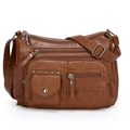 Sac bandoulière en cuir souple marron avec poches zippées et coutures matelassées - Marron