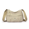 Beige lightweight multi-pocket nylon crossbody bag for women with wide fabric strap - Off White
