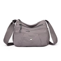 Gray nylon crossbody bag featuring multi-layer zippers and metallic M emblem design - Gray