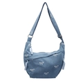 Blue denim half-moon shoulder bag with white bow pattern and adjustable strap - Light Blue