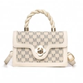 Chic beige crossbody bag with grey M-pattern and gold flower clasp for women - White