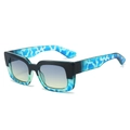 Occhiali da sole quadrati alla moda con montatura bicolore nero-blu e lenti sfumate - Montatura Floreale Nera e Blu Lente Blu