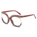 Red oversized cat-eye glasses with sparkling rhinestones and gold metal accents - Lotus Root Pink