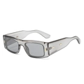 Lunettes de soleil carrées gris translucide avec verres fumés et détails dorés - Monture Grise Verres Gris