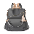 Dark gray waterproof nylon backpack with brown leather trim and tassel detail - Gray / One Size