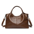 Classic dark brown tote bag in glossy faux leather with distinctive vertical stitching - Nut Brown