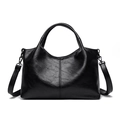 Minimalist black faux leather tote bag with dual handles and adjustable shoulder strap - Black
