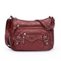 Sac bandoulière en cuir PU bordeaux avec multiples fermetures éclair et détails argentés - Rouge