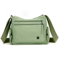 Light green oxford cloth crossbody bag with multiple zippers and wide shoulder strap - Fruit Green