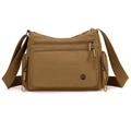 Brown oxford fabric crossbody bag with multiple zip pockets and adjustable strap - Caramel color