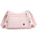 Light pink multi-pocket oxford crossbody bag with adjustable strap and silver logo - Pink