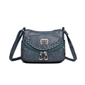 Sac bandoulière gris-bleu en cuir souple avec plusieurs poches zippées et détails tressés - Bleu