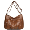 Vintage brown multi-zippered crossbody bag in soft textured leather with rivet accents - Brown