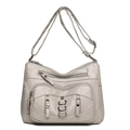 Off-white multi-zipper crossbody bag with litchi grain faux leather and adjustable strap - Off-white