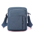 Blue canvas messenger bag with adjustable strap and multiple storage compartments - Denim Blue