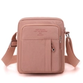 Pink minimalist canvas crossbody bag with multi-layer pockets and adjustable strap - Pink