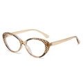 Montatura cat-eye TR90 ambra traslucida con accenti geometrici a triangolo marrone scuro - Montatura Champagne
